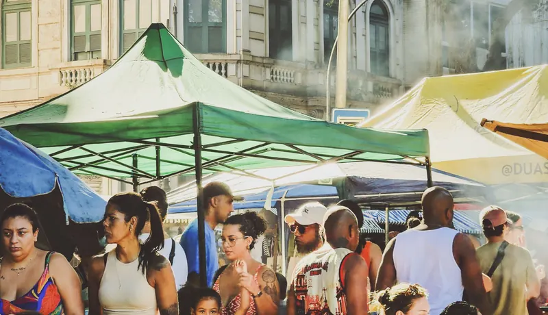 A crowded outdoor food market in Los Angeles on a Sunday afternoon
